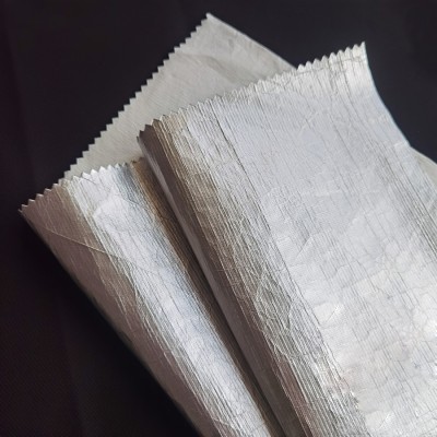 SZ-XR  特衛強  杜邦紙  超薄纸纹纸感防晒衣夹克布料  克重： 55（g/㎡）幅寬：145cm  成份：聚丙烯   45度照